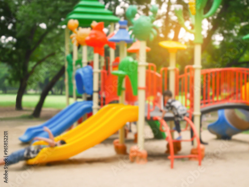 Wallpaper Mural Blurred children playing at playground in the park Torontodigital.ca