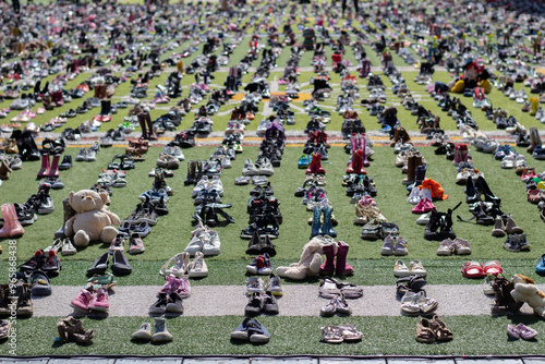 Принти на полотні Nearly 16 thousand pairs of shoes are placed during commemoration event at Schou