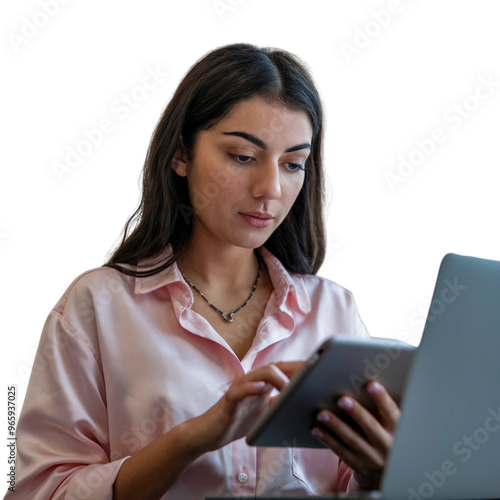 Professional female employee or a businesswoman using a laptop in a modern office. Young happy busy business woman executive using laptop mobile cell phone tech at office photo