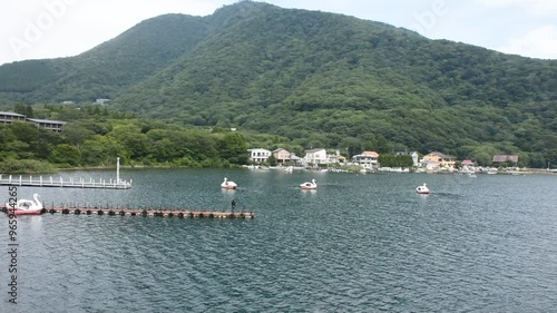 Ducks Pedal Boats and Swan Pedalo watercycle for traveler japanese family people travel visit bike ride boat rest relax in Lake Ashinoko in Hakoneyama at Hakone city on July 6, 2024 in Kanagawa, Japan photo