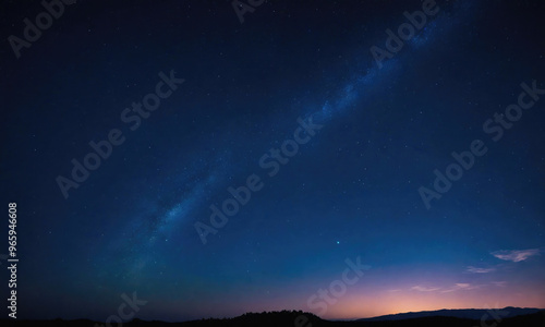 A bright streak of clouds stretches across the dark night sky, with a few stars scattered around