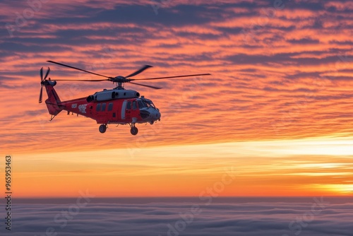 A red and white helicopter flies above a sea of clouds at sunset