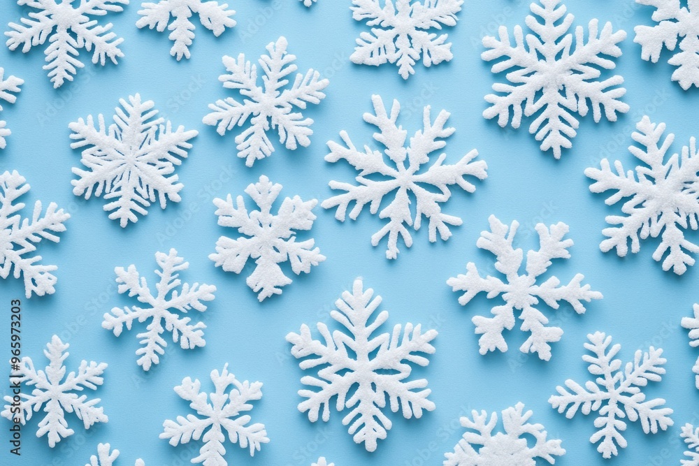 White Snowflake Decorations on a Blue Background White Snowflake Decorations on a Blue Background