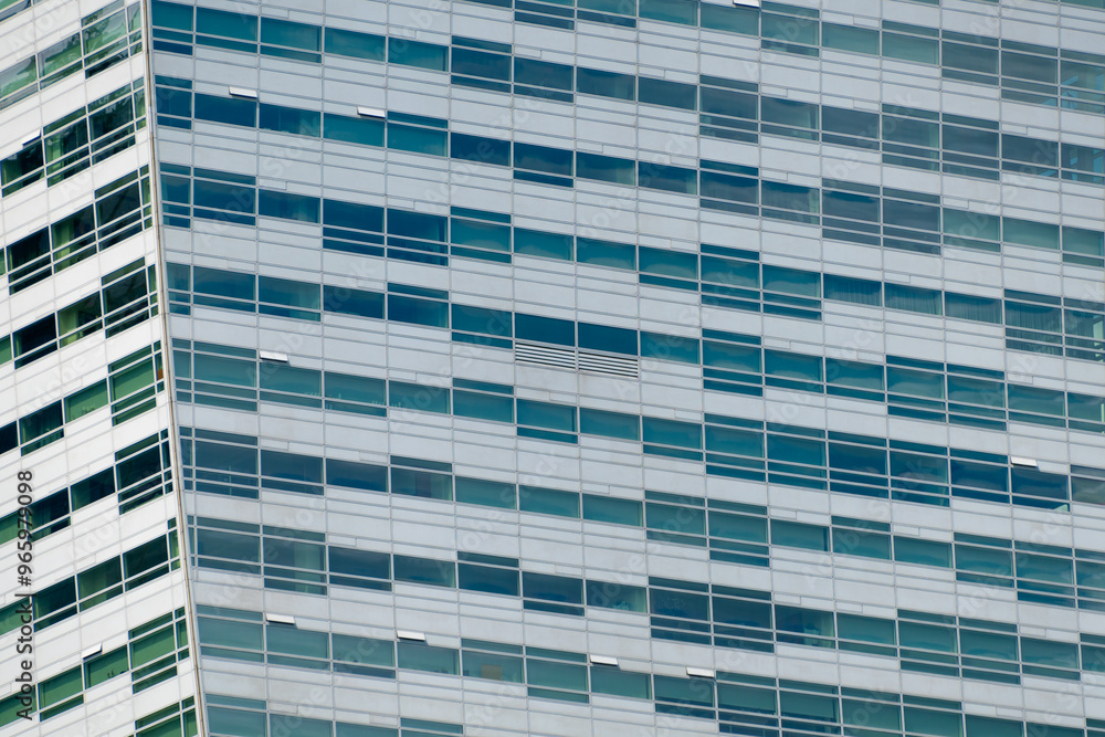 Multi-storey building in the city center. Business center, office. Modern architecture. Details of a modern building. Multi-storey building in the city center. Business center, office. Modern architecture. Details of a modern building.