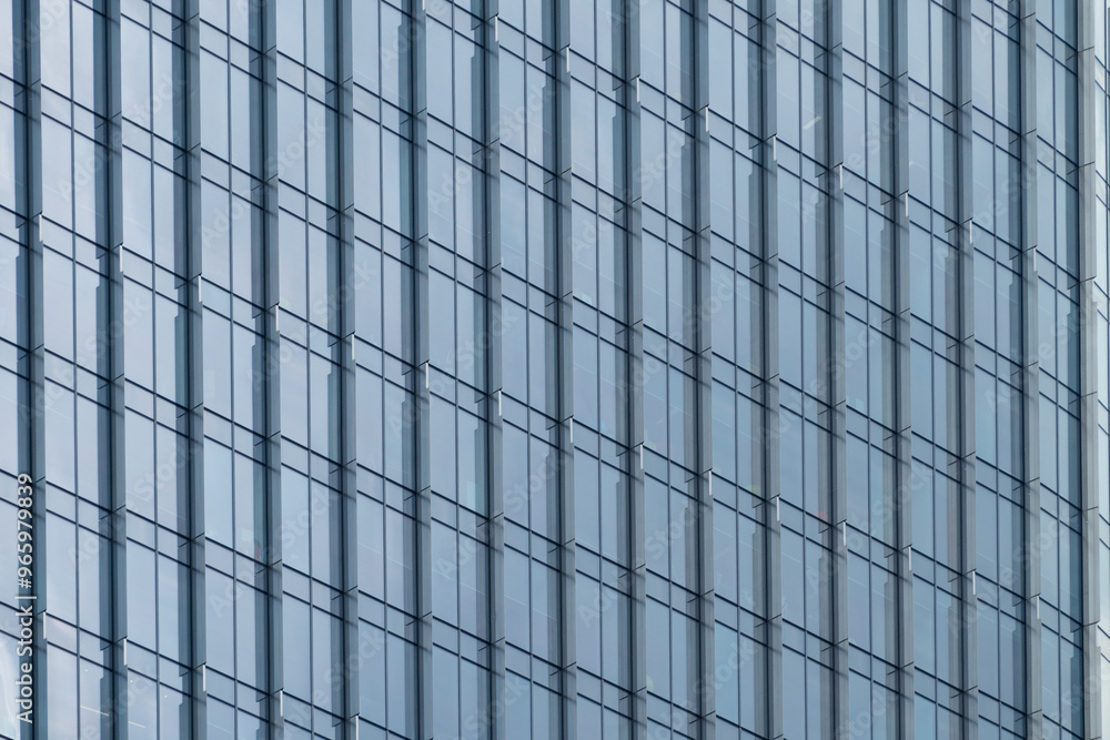 Multi-storey building in the city center. Business center, office. Modern architecture. Details of a modern building. Multi-storey building in the city center. Business center, office. Modern architecture. Details of a modern building.