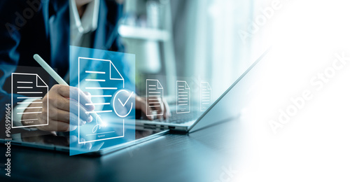 Businesswomen using a stylus pen to sign one document on a virtual notebook screen, E-signing, electronic signature, document management, and paperless office concept. photo