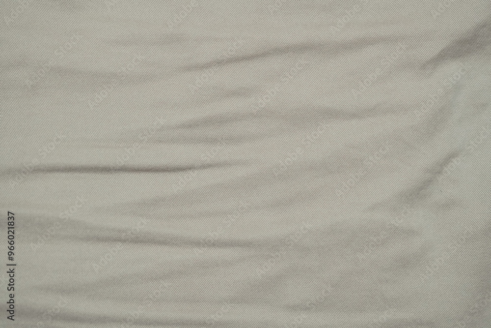 Naklejka premium wrinkled light brown fabric texture clothes