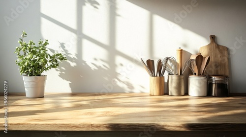 wooden rustic kitchen table. minimalistic interior, utencils on the table photo