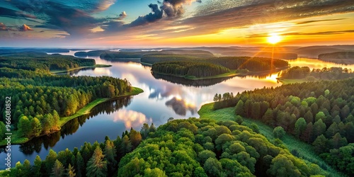 Majestic sunrise illuminates lush green forests and serene lakes of Lithuania's AukÅ¡taitija National Park, showcasing nature's untouched beauty in the Baltic region. photo