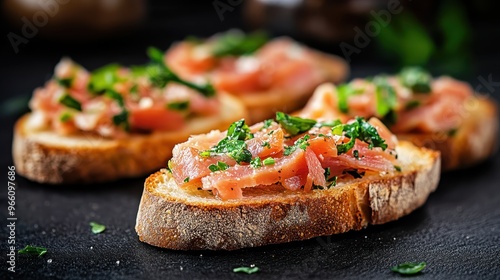 A beautifully arranged gourmet toast topped with thinly sliced salmon, fresh green herbs, and seasoning on rustic bread, showcasing elegance and sophistication in fine dining.