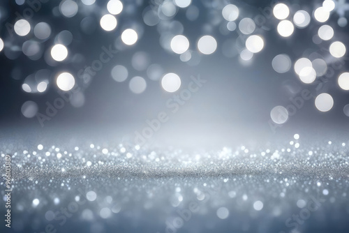 Beautiful luxury gold bokeh on defocused emerald silver background.