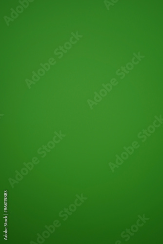 Grassy green vertical background slightly gradient to sides and bottom. Moderately bright monochrome background as a template with space for copy text and image.