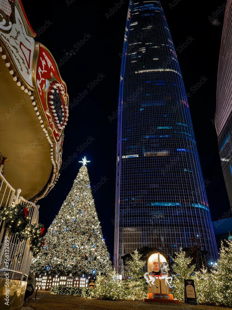 Christmas pine tree near Lotte World Tower. Seoul city, South Korea.