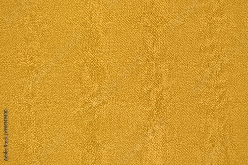 Textured cotton chino yellow fabric, showcasing a soft and smooth surface with a uniform color. photo