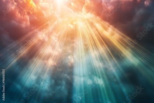 A dramatic view of the sky with bright rays of light shining through the clouds, creating a sense of hope and inspiration.