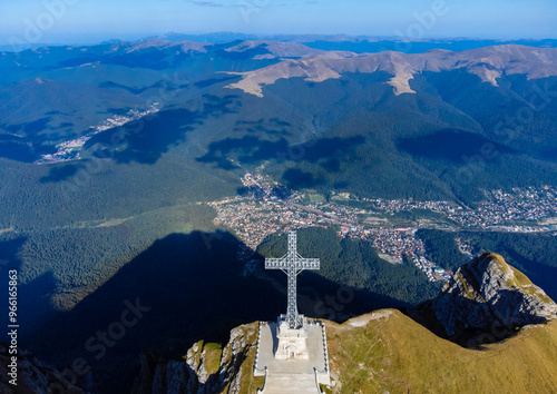 Landscape with the Caraiman Heroes cross from Bucegi mountains - Romania photo