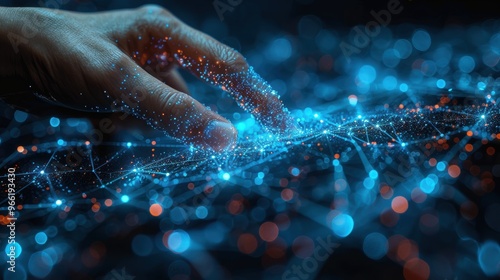 Finger touching a digital, glowing connection on a dark blue background, a technology and business concept with a hand holding a virtual polygon mesh line network for global online communication.  photo