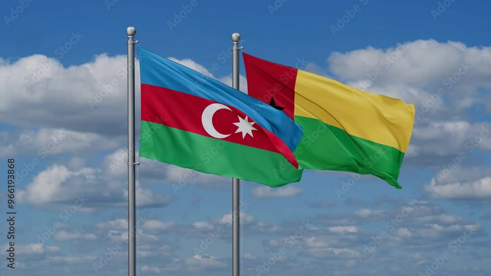 Guinea-Bissau and Azerbaijan flags flying together, video concept of the relationship, two country relations concept Guinea-Bissau and Azerbaijan flags flying together, video concept of the relationship, two country relations concept