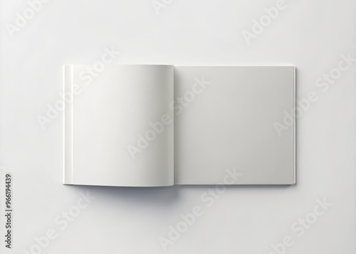 Horizontal flat lay of a blank square booklet cover mockup with a modern design, matte finish, and subtle