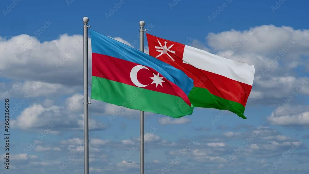 Oman and Azerbaijan flags flying together, video concept of the relationship, two country cooperation concept Oman and Azerbaijan flags flying together, video concept of the relationship, two country cooperation concept