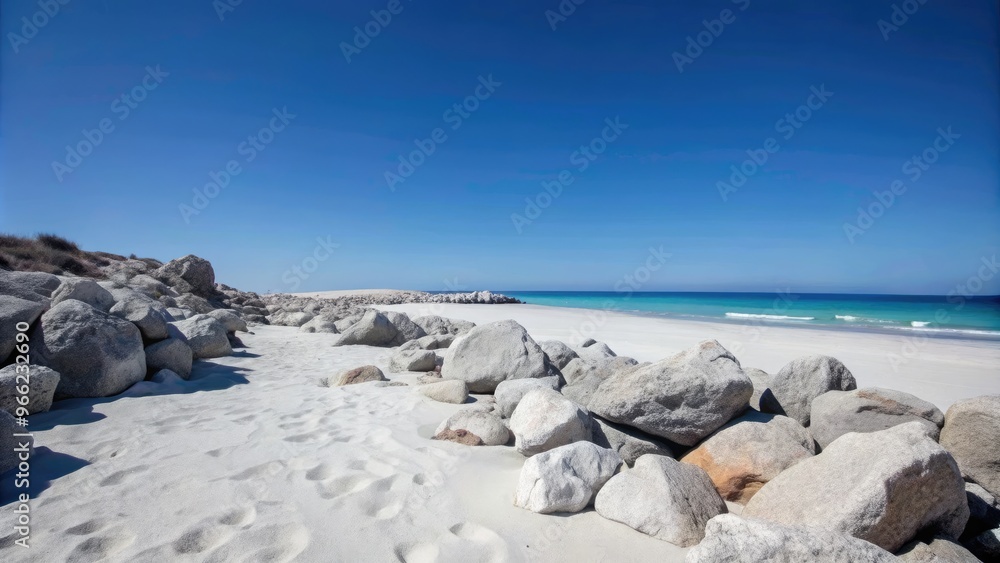 Rocky shoreline with white sand and a clear blue sky. Rocky shoreline with white sand and a clear blue sky.