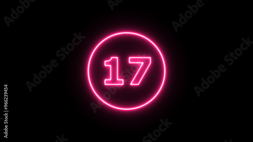 Glowing neon number 17 , neon light colorful number of illustration on black background. Glowing neon lighting on dark background. Numbers futuristic style