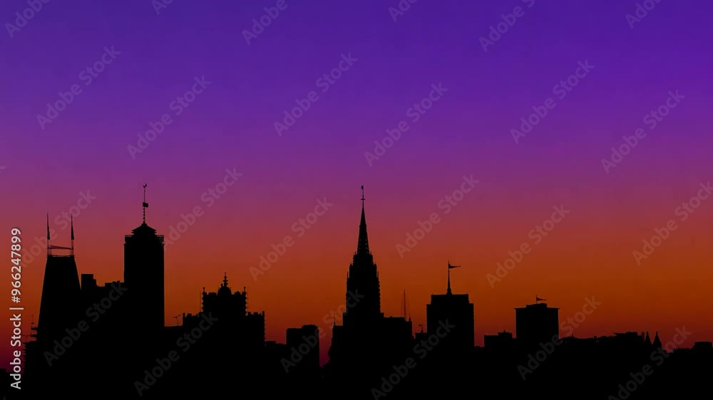 The nashville skyline is silhouetted against a beautiful orange and purple evening sky, creating a sense of peace and tranquility The nashville skyline is silhouetted against a beautiful orange and purple evening sky, creating a sense of peace and tranquility