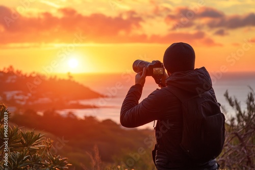 Capturing a vibrant sunset: photographer takes stunning shot by the ocean