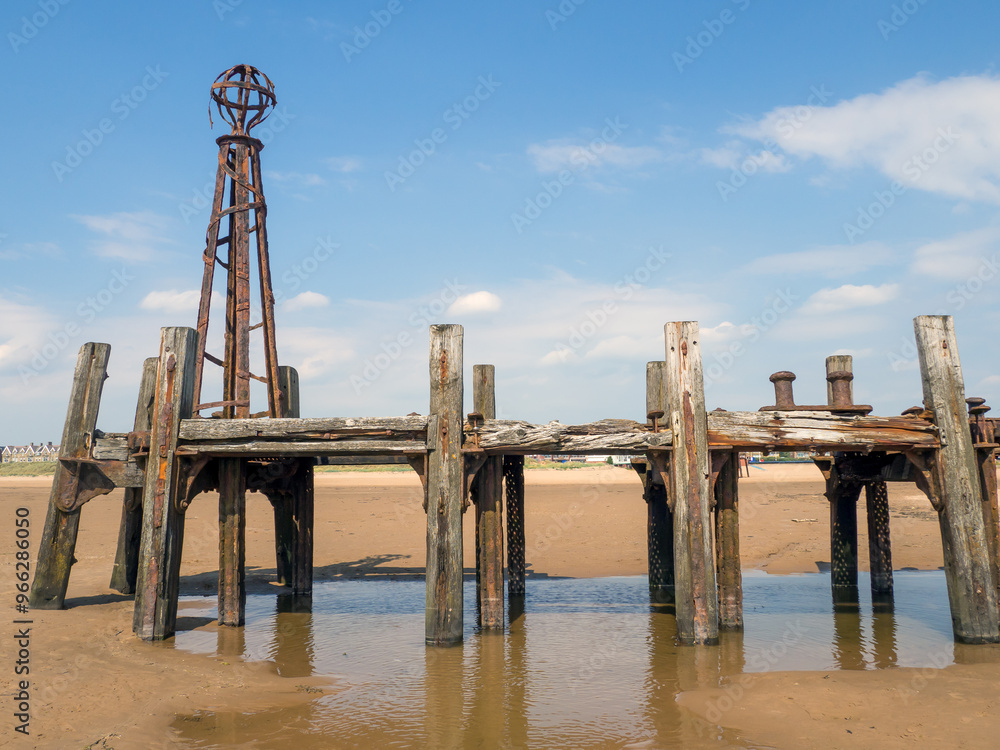 the remains of the wooden landing jetty which used to be at the end of St Annes Pier in Lancashire which was used for steam boat services from Blackpool and Liverpool the remains of the wooden landing jetty which used to be at the end of St Annes Pier in Lancashire which was used for steam boat services from Blackpool and Liverpool