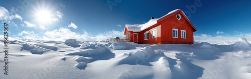 A bright red research station is nestled in the snow-covered Antarctic landscape