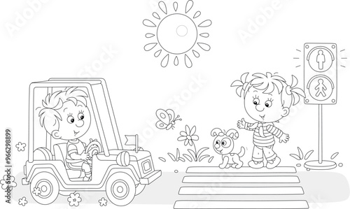 Little boy driving a small ...