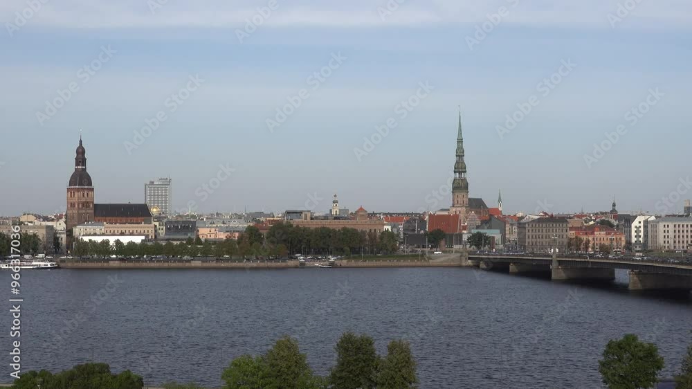Riga, Latvia A skyline view of the old city, bridges, and the Daugava River. Riga, Latvia A skyline view of the old city, bridges, and the Daugava River.