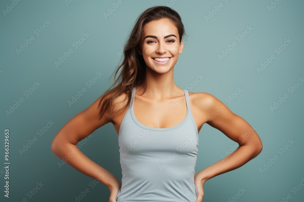 Young woman dressed in a fitness kit Young woman dressed in a fitness kit