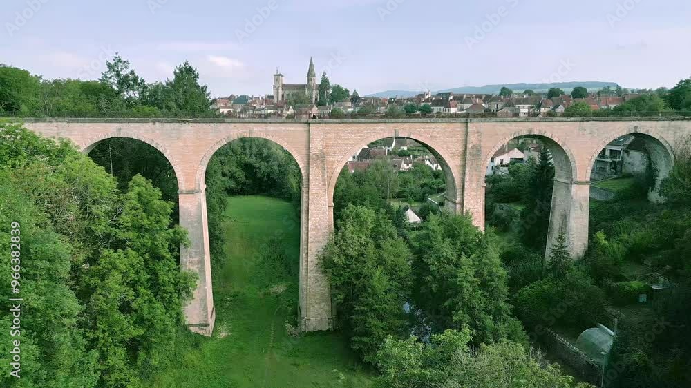 Medieval Fortress Towers, Church, and Bridges in Burgundy, Drone.Aerial Shot of Medieval Architecture and Bridges in France Medieval Fortress Towers, Church, and Bridges in Burgundy, Drone.Aerial Shot of Medieval Architecture and Bridges in France