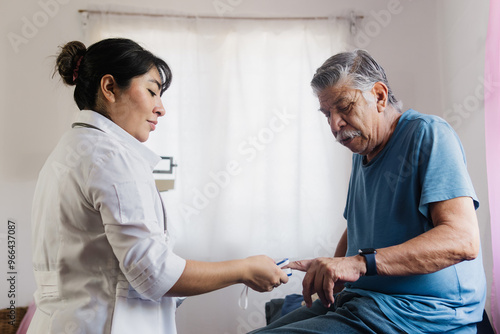 An older adult at a medical checkup in a young nurse's office.