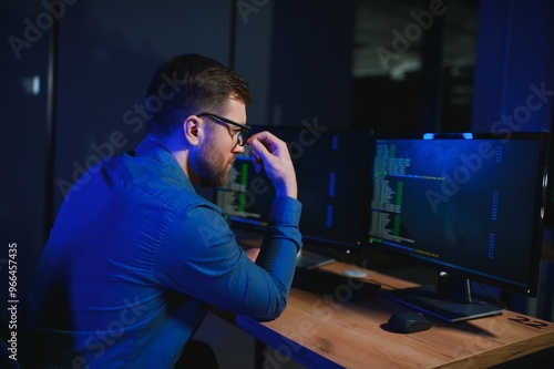 programmer working at desk in office