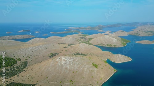 An expansive aerial view of Kornati National Park, showcasing the breathtaking archipelago of islands scattered across the deep blue waters of the Adriatic Sea in Croatia photo