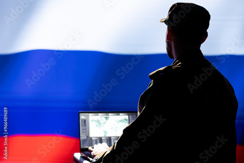 Tableau sur toile Kremlin regime russian agent combating organized crime and terrorism using detection system on laptop