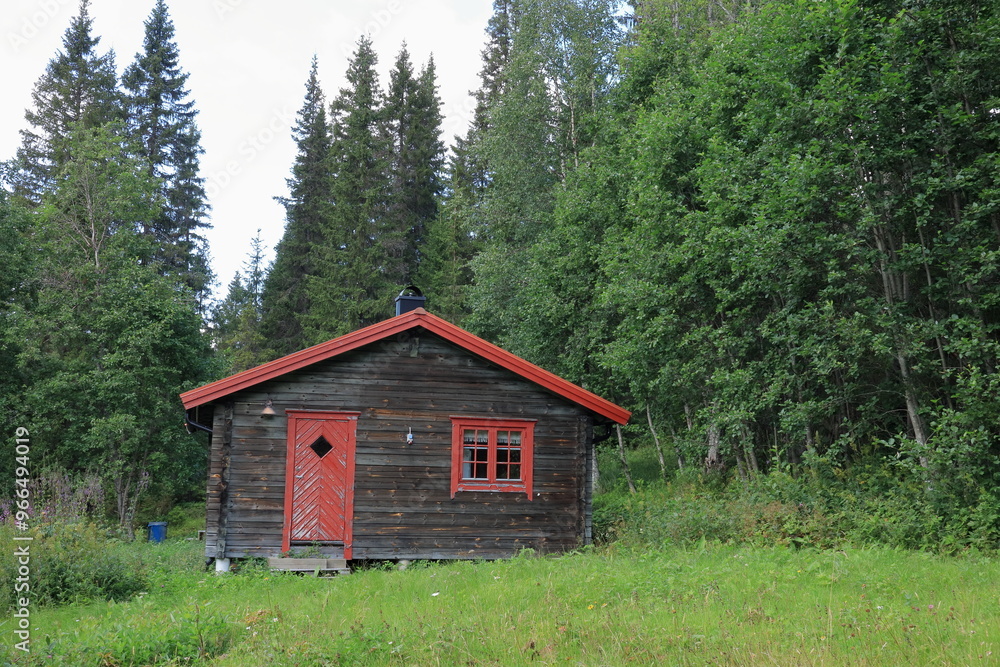 Building or wooden cabin at the Swedish countryside. August 2024. Jämtland, Sweden, Europe. Building or wooden cabin at the Swedish countryside. August 2024. Jämtland, Sweden, Europe.