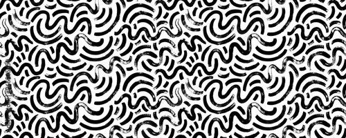 Abstract squiggle and doodle lines seamless pattern. Simple childish scribble wallpaper print with curved brush strokes and swirled lines. Simple party confetti texture, childish scribble backdrop.