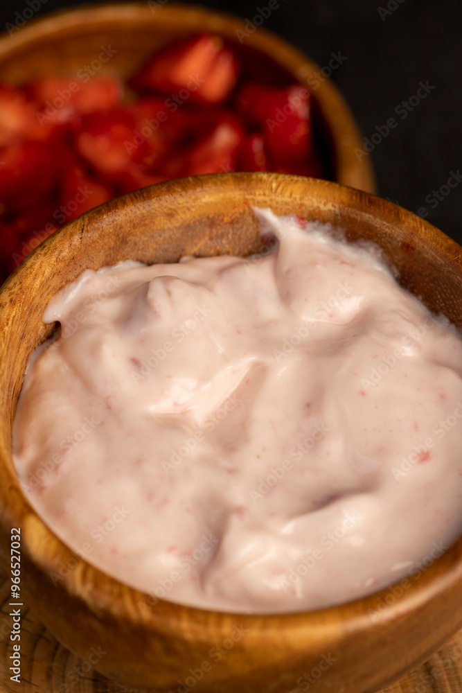 Fototapeta premium fresh natural yogurt with added strawberry flavor with berries
