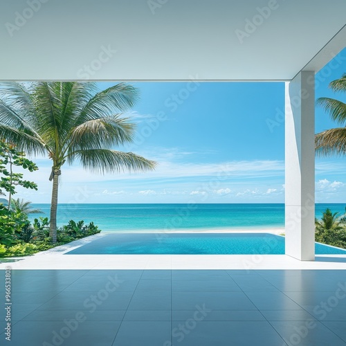 A beautiful view of the ocean with a pool and palm trees in the background. Scene is serene and relaxing