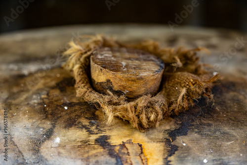 Aging process of cognac spirit in old dark French oak barrels in cellar in distillery house, Cognac white wine region, Charente, Segonzac, Grand Champagne, France photo