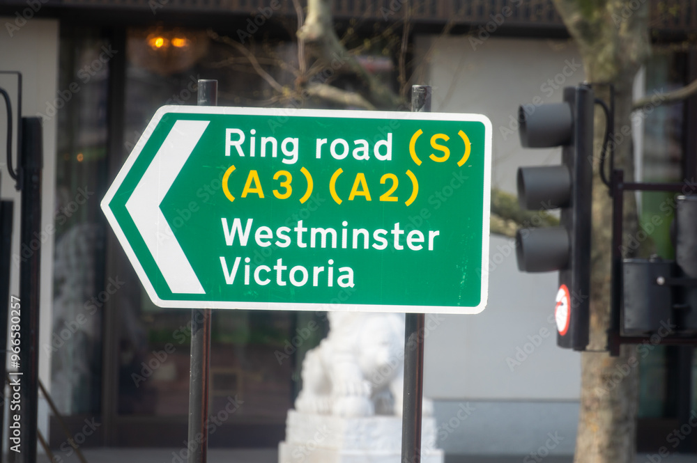 Obraz premium Transportation in London city, roads, road signes, street signes, warnings, indicating of directions in Great Britain, city life in England