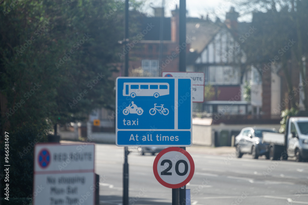 Transportation in London city, roads, road signes, street signes, warnings, indicating of directions in Great Britain, city life in England Transportation in London city, roads, road signes, street signes, warnings, indicating of directions in Great Britain, city life in England