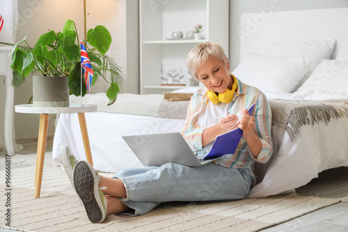Mature woman learning Engli...