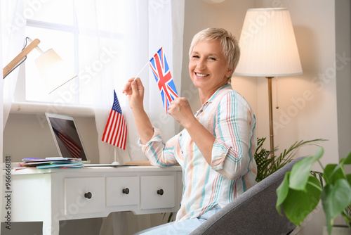 Mature woman with UK flag l...