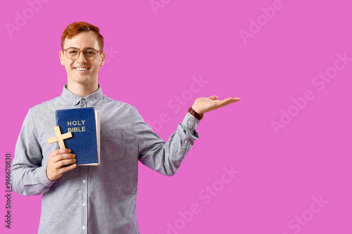Young redhead man with Bibl...
