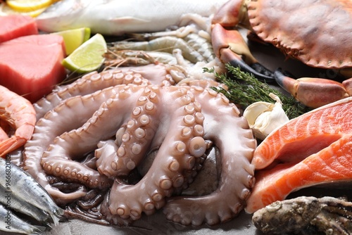 Many different sea food and thyme on table, closeup