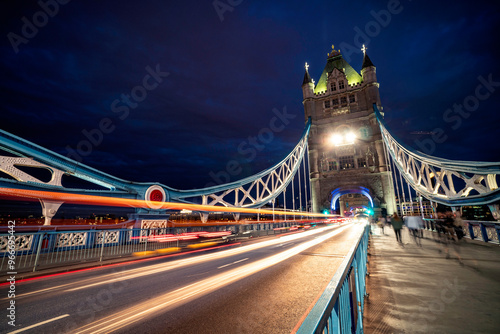 Tower Bridge and traffic light at twilight in London